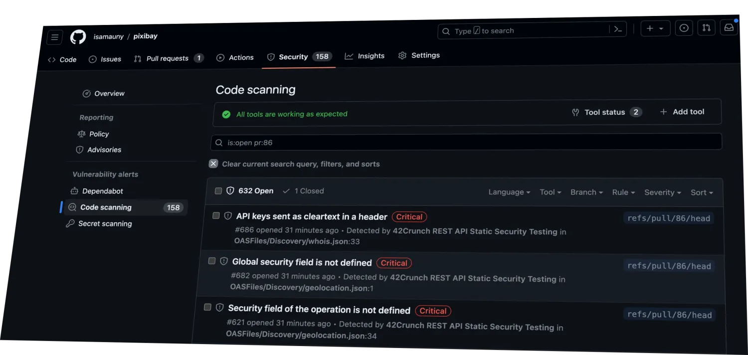 GitHub Code Scanning Alerts page inside a live PR showing three Critical findings detected by the 42Crunch REST API Static Security Testing action — 'API keys sent as cleartext in a header' in OASFiles/Discovery/whois.json line 33, 'Global security field is not defined', and 'Security field of the operation is not defined' — all opened 31 minutes earlier on PR #86 before the change merges